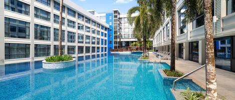 3 outdoor pools, open 8:00 AM to 10:00 PM, pool umbrellas, sun loungers