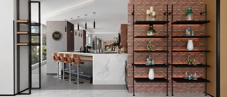 A modern kitchen with a marble countertop, a brick accent wall, and a bar area with stools.