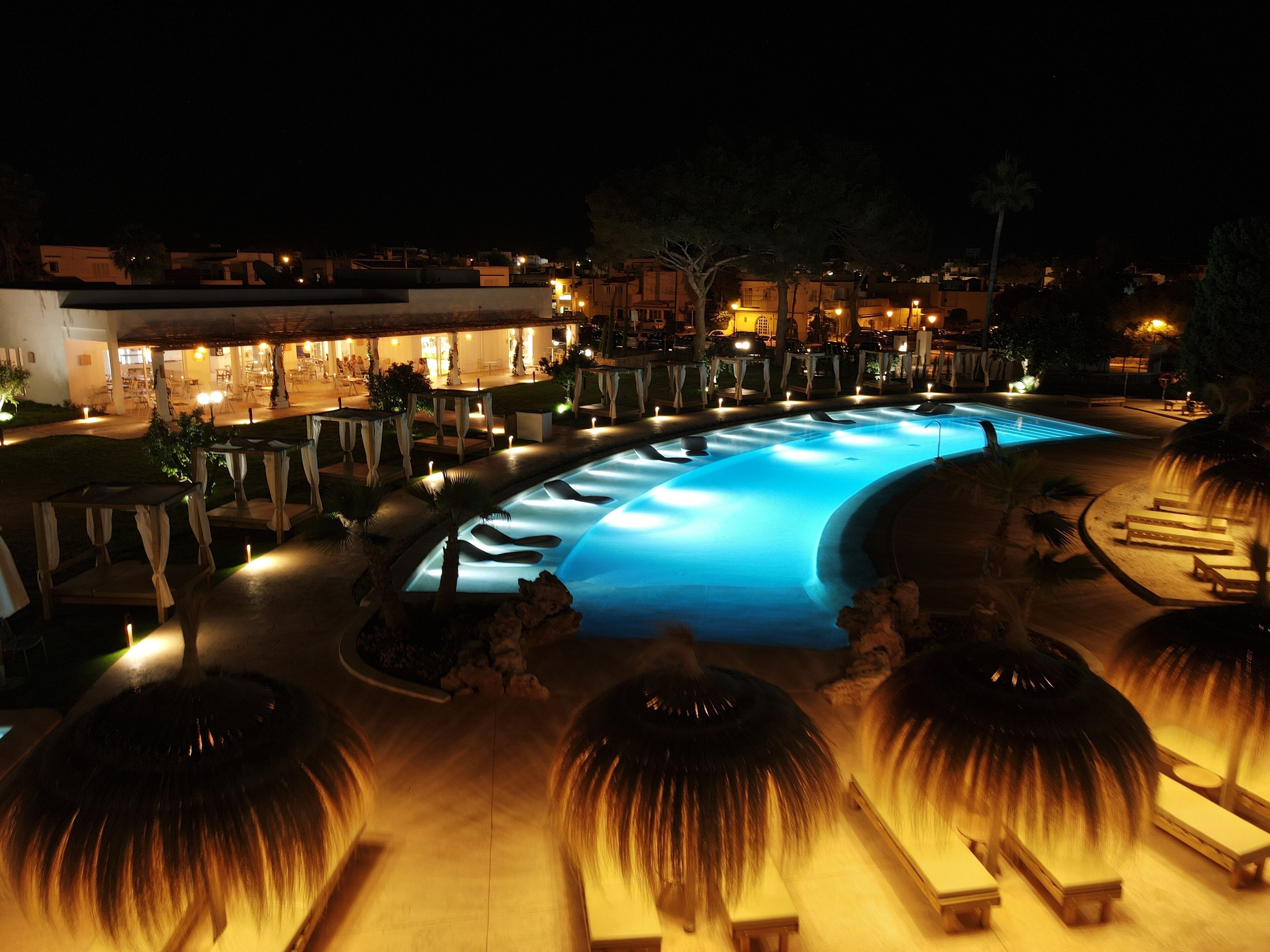 outdoor pool, pool umbrellas, pool loungers