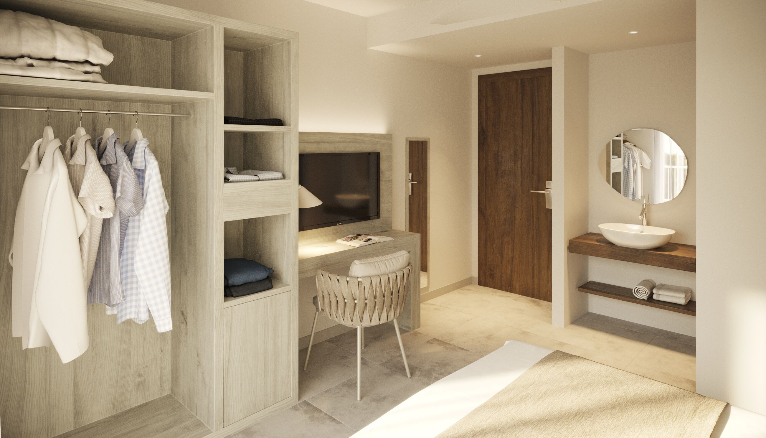 Un dormitorio moderno con un armario de madera, un escritorio con televisor, un espejo redondo y un baño con lavamanos y toallero.