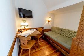 Habitación familiar | Zona de estar | Una televisión de pantalla plana