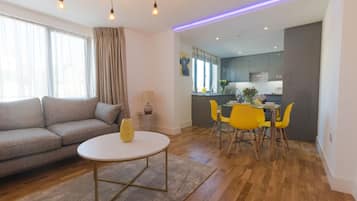 Deluxe appartement | Woonruimte | Flatscreentelevisie