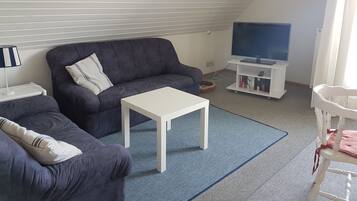 Apartment, Balcony (incl. cleaning fee 39 EUR) | Living area | Flat-screen TV