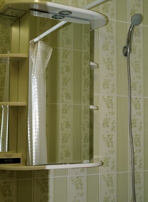 Shower, free toiletries, hair dryer, slippers