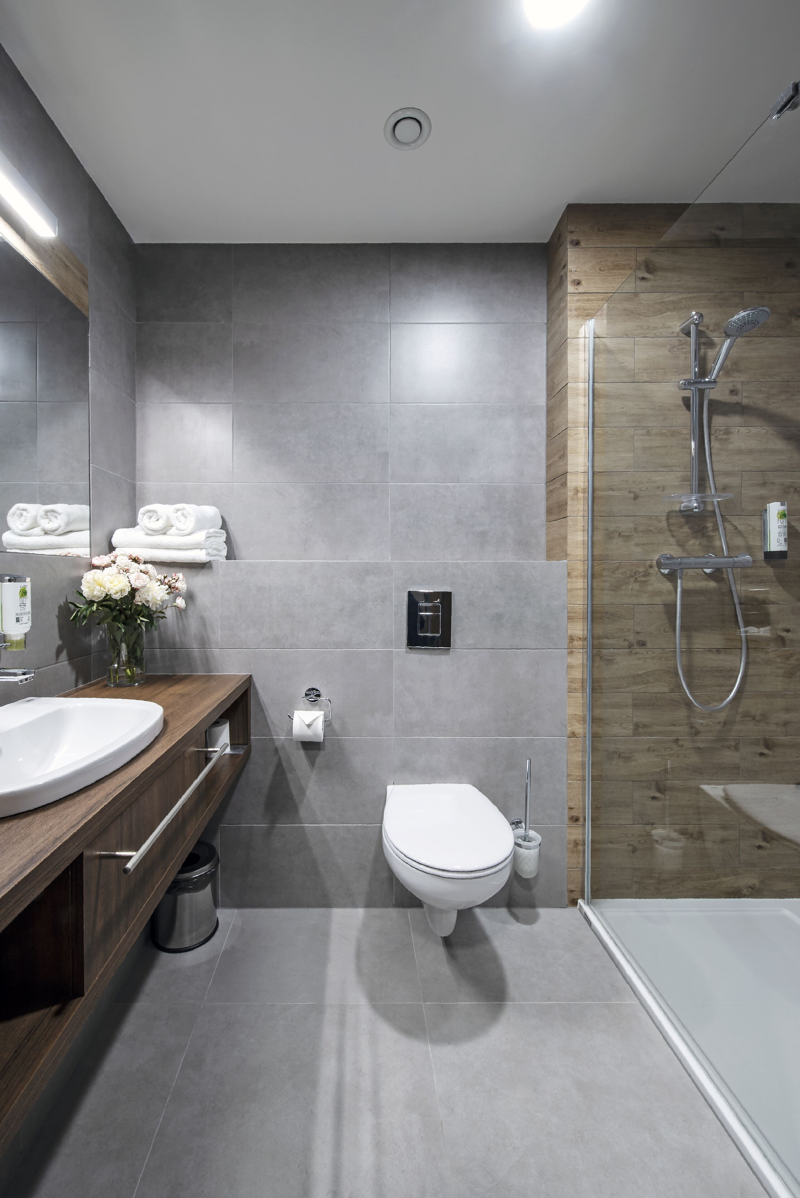 deluxe double or twin room with extra bed | bathroom | shower, designer toiletries, hair dryer, towels