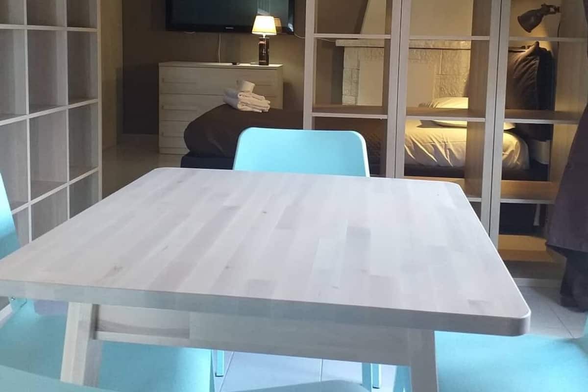 Tripla Comfort | Area soggiorno | TV a schermo piatto