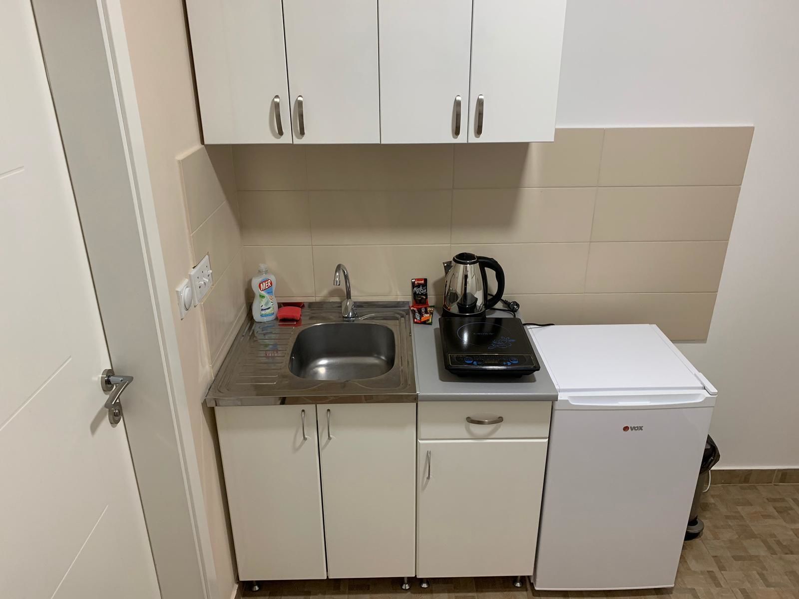 standard apartment | private kitchenette | fridge, stovetop, electric kettle, cookware/dishes/utensils