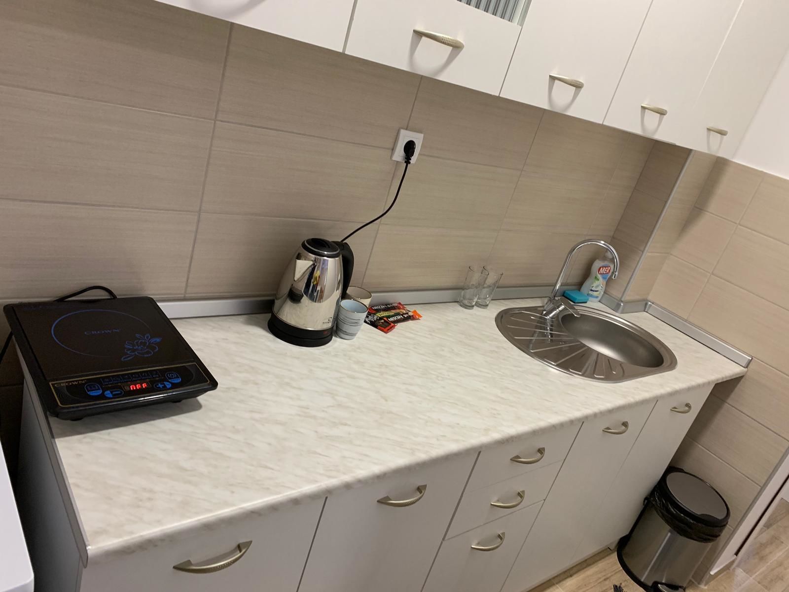 deluxe apartment | private kitchen | fridge, stovetop, electric kettle, cookware/dishes/utensils