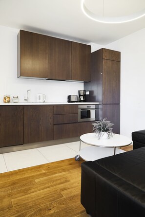 Departamento Confort, 2 habitaciones | Cocineta privada | Refrigerador con congelador, horno, parrilla de estufa y lavavajillas 