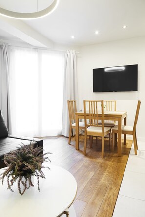 Comfort Apartment, 2 Bedrooms | Living room | 43-inch flat-screen TV with digital channels, TV - Contemporary Apartment Pilsudskiego Str. (Kraków)
