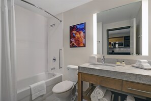 Ducha y bañera combinadas y toallas