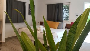 Quarto triplo conforto | Camas com colchões pillow-top, cortinas blackout