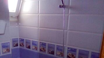 Family Apartment, 2 Bedrooms | Bathroom | Bathtub, spring water bathtub, free toiletries, hair dryer