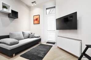 Suite Studio Affaires (F) | Coin séjour | Télévision à écran plat de 43 pouces avec chaînes par câble, télévision