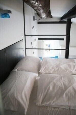 1 bedroom, desk, iron/ironing board, travel crib