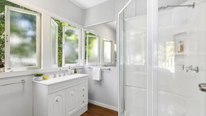 Shower, hair dryer, soap, shampoo