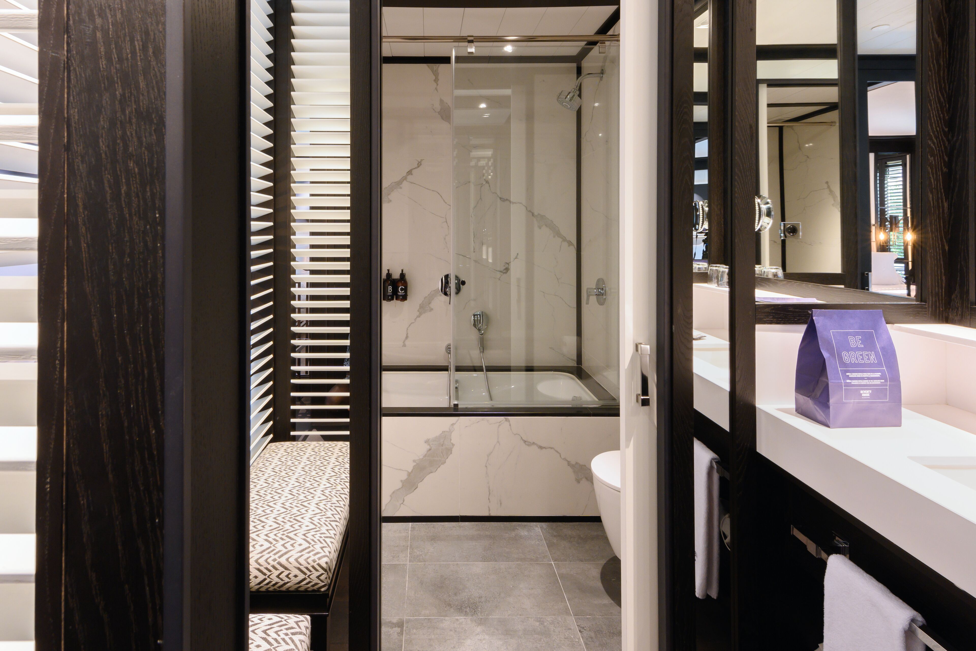 deluxe double or twin room (lounge terrace) | bathroom | rainfall showerhead, eco-friendly toiletries, hair dryer, slippers