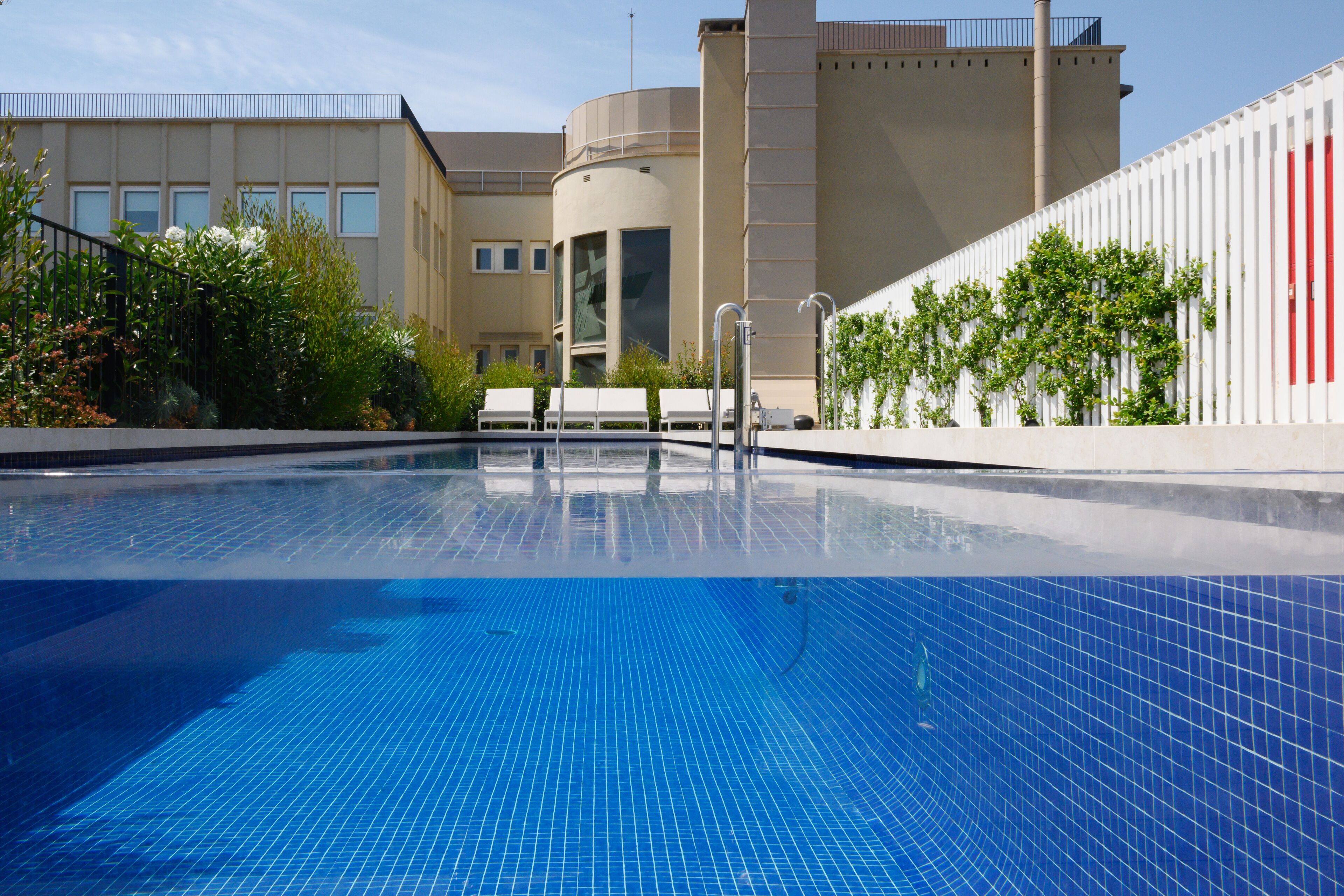 Seasonal outdoor pool, open 9:00 AM to 9:00 PM, sun loungers