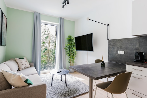 One-Bedroom Suite L | Living room | Smart TV
