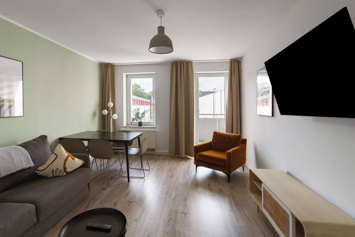 Two-Bedroom Suite XL with balcony | Living area | Smart TV