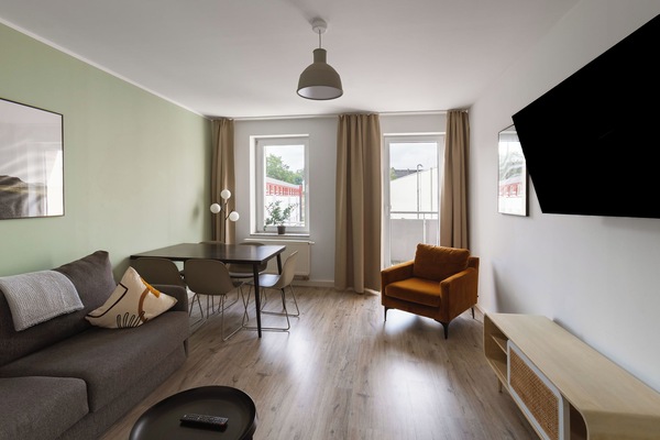 Two-Bedroom Suite XL with balcony | Living area | Smart TV