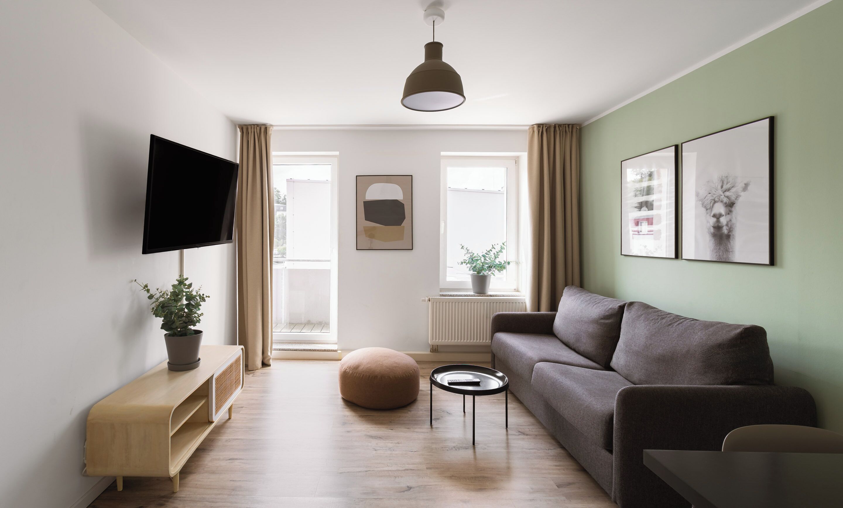 One-Bedroom Suite with balcony | Living area | Smart TV