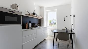 One-Bedroom Suite with balcony | Private kitchen | Fridge, espresso maker, electric kettle