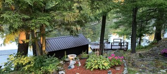 Entspannen Sie sich in dieser friedlichen Forellensee-Hütte - inklusive Motorboot und WIFI