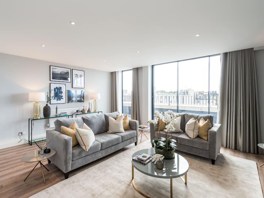 Apartamento superior, 4 quartos | Área de estar | TV