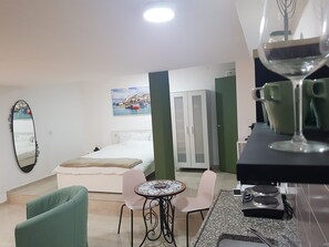 Comfort Double Room Single Use | Living area | 40-inch LCD TV with satellite channels, TV, Netflix