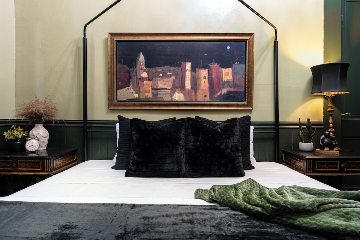 Premium bedding, desk, laptop workspace, iron/ironing board