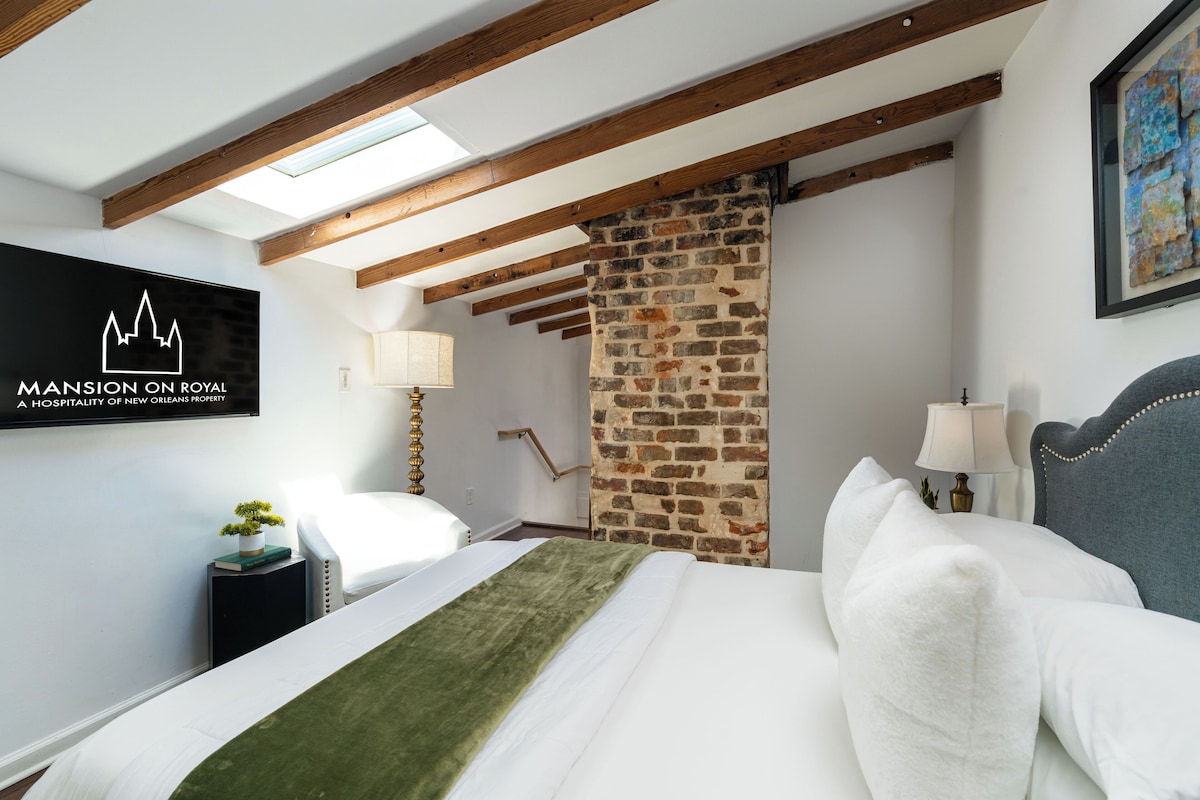 Premium bedding, desk, laptop workspace, iron/ironing board