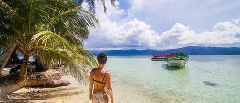 On the beach, sun loungers