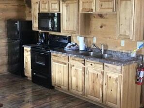 Superior Cabin, 2 Bedrooms, Mountain View | Private kitchen | Full-size fridge, microwave, oven, stovetop - Gardiner Cabin Getaway (Gardiner)