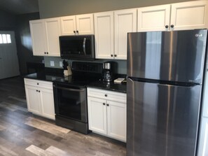 Cabana luxo | Cozinha privada | Geladeira grande, micro-ondas, fogão, cooktop