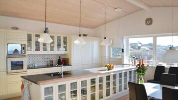 Fridge, stovetop, dishwasher, coffee/tea maker