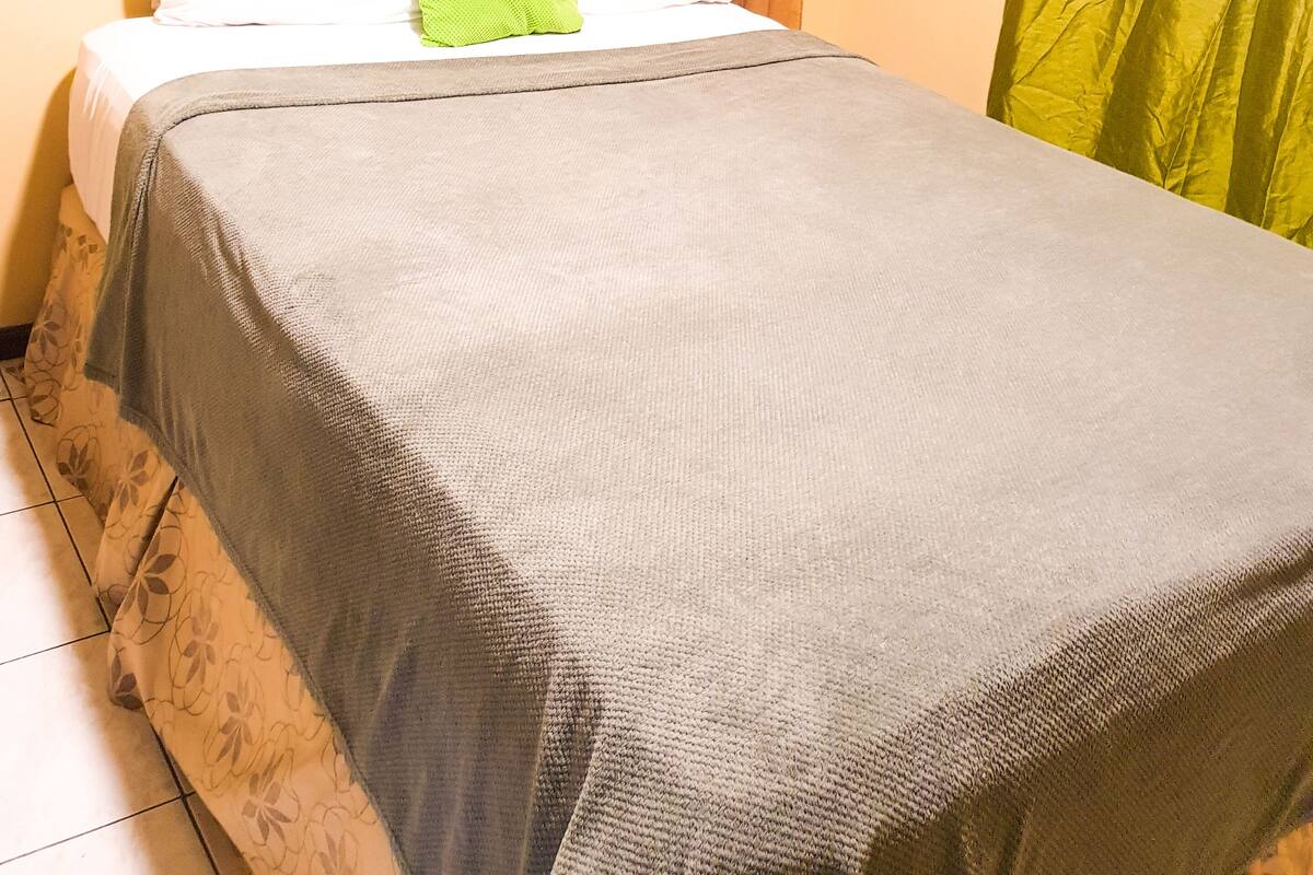 Premium bedding, pillow-top beds, blackout curtains, iron/ironing board