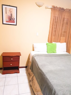 Premium bedding, pillow-top beds, blackout curtains, iron/ironing board