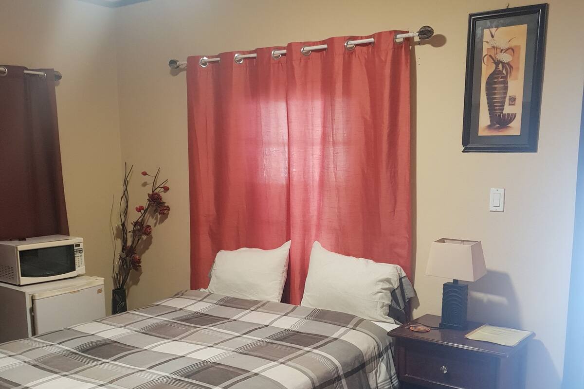 Premium bedding, pillow-top beds, blackout curtains, iron/ironing board