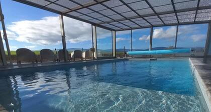 Charming 5-Bedroom House with Pool, Spa, Sauna & Fishing Pond in Tranquil Pastures
