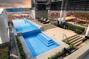 Outdoor pool - Studio Unit at Vinia Residense for Staycation in Quezon City, Philippines (Balintawak)