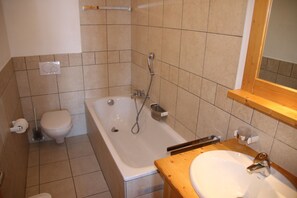 Baignoire, sĂšche-cheveux