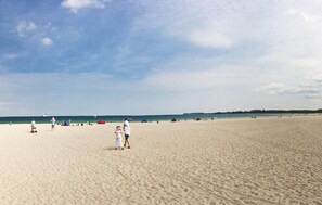 On the beach, water skiing