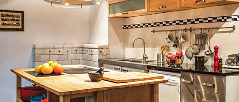 Fridge, stovetop, dishwasher, coffee/tea maker