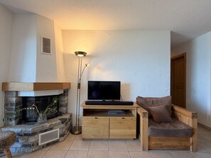 Fernseher, Kamin
