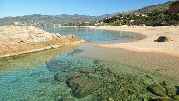 A clear coastal beach with rocky formations and a sandy shore. - Beautiful house. Wonderful sea view (Casaglione)