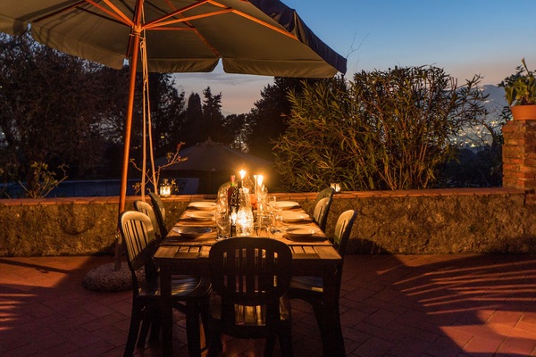 Dining out at Simple Farmhouse with shared pool