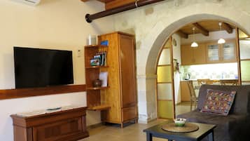 Smart-tv, een open haard, Netflix en boeken