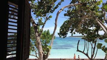 Enjoy the serene ocean views from this veranda.
