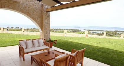 Pefkochori villa with a stunning panoramic view and a waterfall private pool.